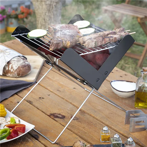 Taitettava ja kannettava minihiiligrilli Foldecue InnovaGoods