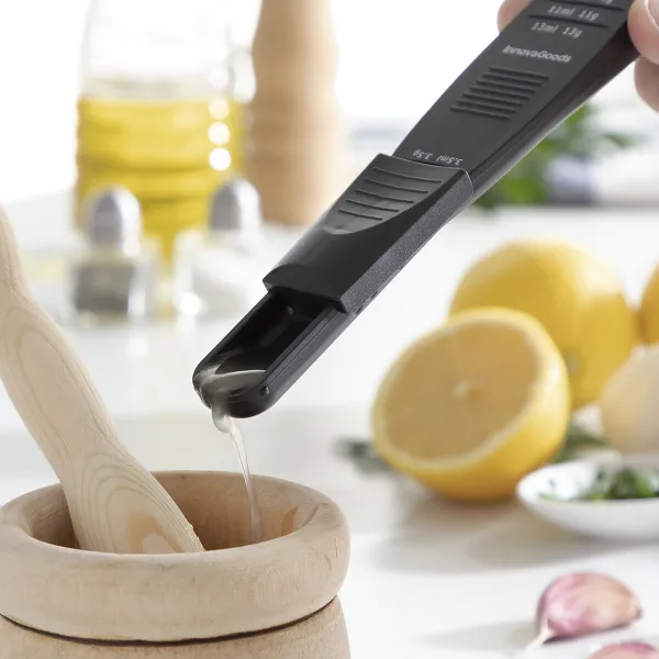 9-in-1 reguliuojamas matavimo šaukštas Ninoon InnovaGoods