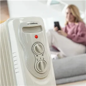 Öljytäytteinen lämpöpatteri Oinine InnovaGoods 2000 W (9-lokeroinen)